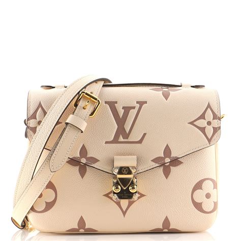 lv crafty pochette métis|Pochette Métis Bicolor Monogram Empreinte Leather .